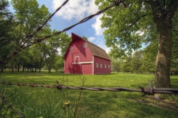 A restored red barn is part of the Adams Homestead and Nature Preserve's homestead area. Photo by Christian Begeman.