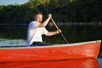 Trevor shows off his rowing skills.