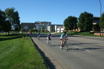 Athletes ride through Yankton on the 14.2 mile bike ride.