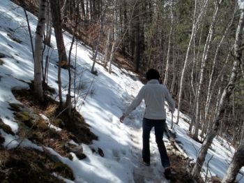 Snow on the trail makes the hike a little more difficult.