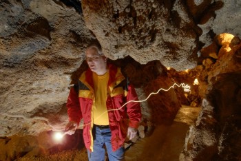Self portraits with a long exposure, off-camera flash and streaking flashlight trails show photographer Chad Coppess visiting Black Hills Caverns near Rapid City.