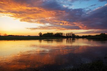 Sunset reflected in the Big Sioux River between Dell Rapids and Trent.