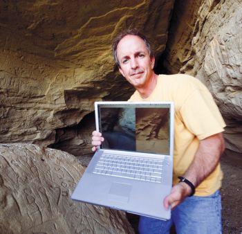 Paul Horsted used a laptop on the trail to compare William Illingworth’s photos to his own.