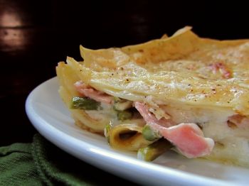 Ham and asparagus lasagna combines the flavors of a traditional Easter meal with hearty pasta and a creamy cheese sauce.