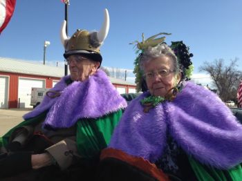 Grand Marshals Marvin Martilla and Lila Grape wear royal purple and Nile green, traditional colors of St. Urho's Day.