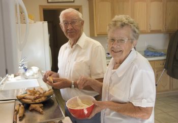 Swede and Ardys Olson, partners in a krumkake-making tradition.
