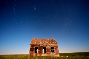 The moon was out at Lightcap, SD in June — it lit up the landscape like the sun after the long hour and 20 minute exposure. Lightcap was a town at one point earlier in the century, but now only the schoolhouse and one other building remain.