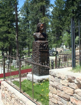 A statue marks the grave of Wild Bill Hickok.