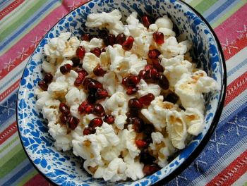 Pomegranate seeds provide antioxidants and a sweet counterbalance to a bowl of salty popcorn.