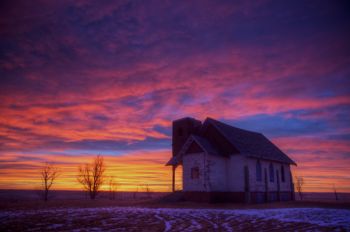 More colorful sunrise skies above an abandoned country church northeast of Firesteel.