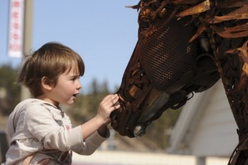 A boy marvels at “Iron Star” by <a href='http://www.lopez-ranch.net/' target='_blank'>John Lopez</a>. Photo by Bernie Hunhoff. Click to enlarge photo.