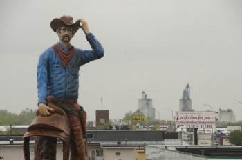 A giant cowboy watches over Watertown.