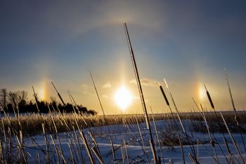 Sun dog sunset after a ground blizzard abated west of Sioux Falls.