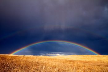 A double rainbow west of Vivian after an early autumn wind and rainstorm.