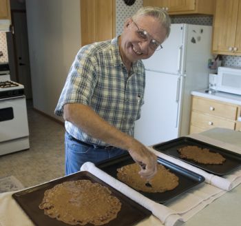 'Women cook 365 days a year; a guy does one thing and look who gets the credit,' quipped Marion Kryger, as he made peanut brittle.