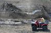 Kevin Wright, Rapid City, plows through a bog in his Mud Mafia  Scrat  truck.