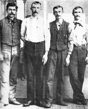 Hartington, Neb., photographer E.S. Kibbe shot this photo of Frank and Jesse James (third and fourth from right) with two Nebraskans, Adolph Gerdau and W.H. Harm.