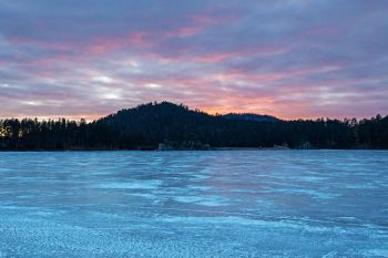 Sunset over frozen Stockade Lake.