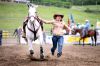 Bernie Hunhoff, editor-at-large, and Paul Higbee, contributing editor, chose this photo by Doug Jorgensen. “A rodeo fan understands we re looking at true teamwork — cowgirl and horse. But maybe what I like best is how in some of parts of the country most people couldn t tell you exactly what s happening,” Higbee says. “They might guess it to be some sort of bizarre human vs. horse footrace. Or that the cowgirl fell off her horse and is trying to get it to stop. In South Dakota, of course, we know that a goat is about to get its legs tied, real fast.”