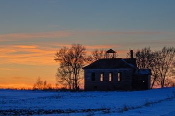 An abandoned country school at sunset in Union County.