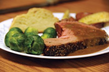 Bad memories of eating lamb will quickly vanish after sampling this roast lamb with coffee-brandy sauce.