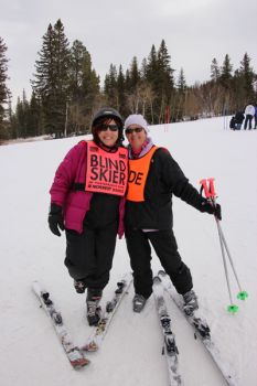 Sherry DeFrancesco, North Dakota, with guide Deb Tinker from Lead at Black Hills Ski for Light 2013. DeFrancesco will marry Jesse Shirek at Wednesday night's bonfire.